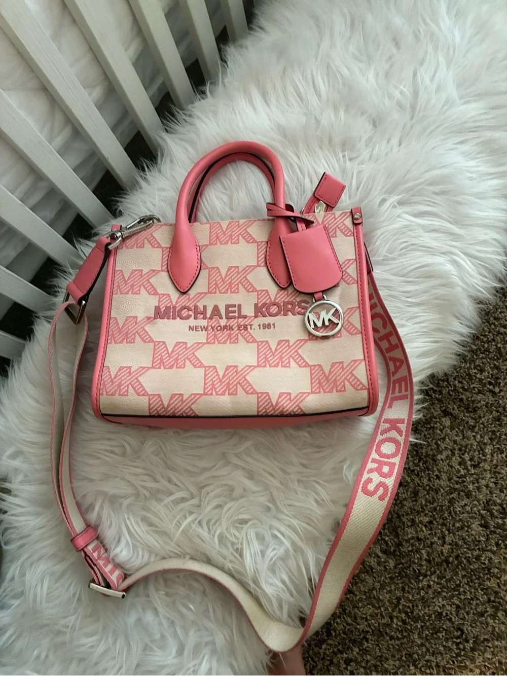 Michael Kors Mirella Small Logo Jacquard Crossbody Bag tea rose pink colorway.